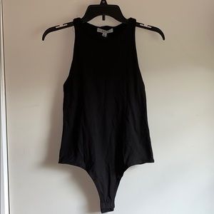 Black body suit with built in bra
